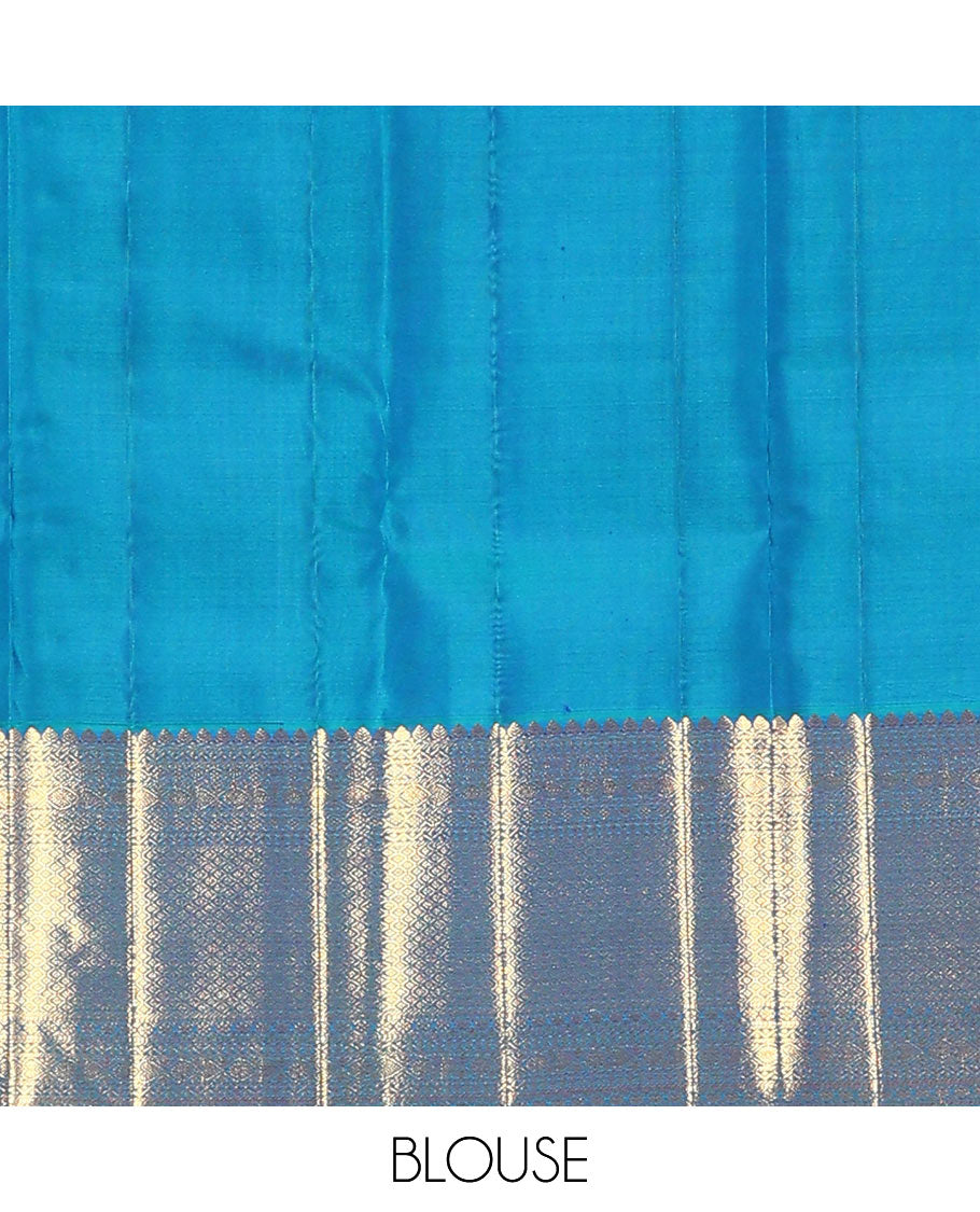 Blue jacquard kanchipuram silk saree, zari border of thilakam mokku, neli, kodi visiry, jada nagam, and jaal designs, and jaal pallu