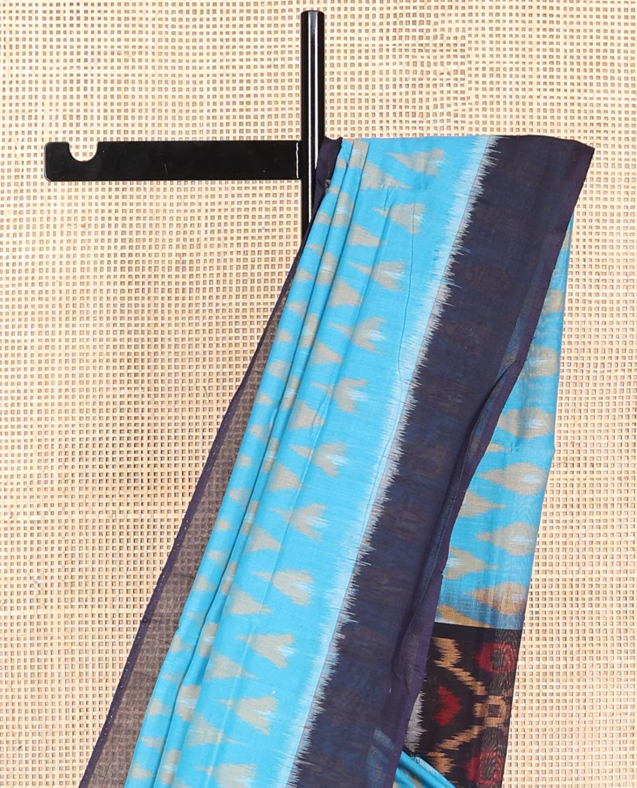 Light blue geometric design ikkat cotton saree with contrast border & argyle design pallu