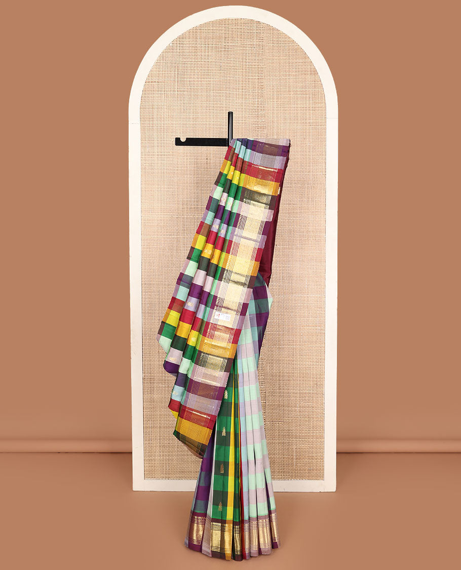 Multi-color paalum pazhamum style checked and zari buttas Kanchipuram silk saree, one-sided border of paneer sombu, banaras, muthu, and jaal and contrast zari design pallu