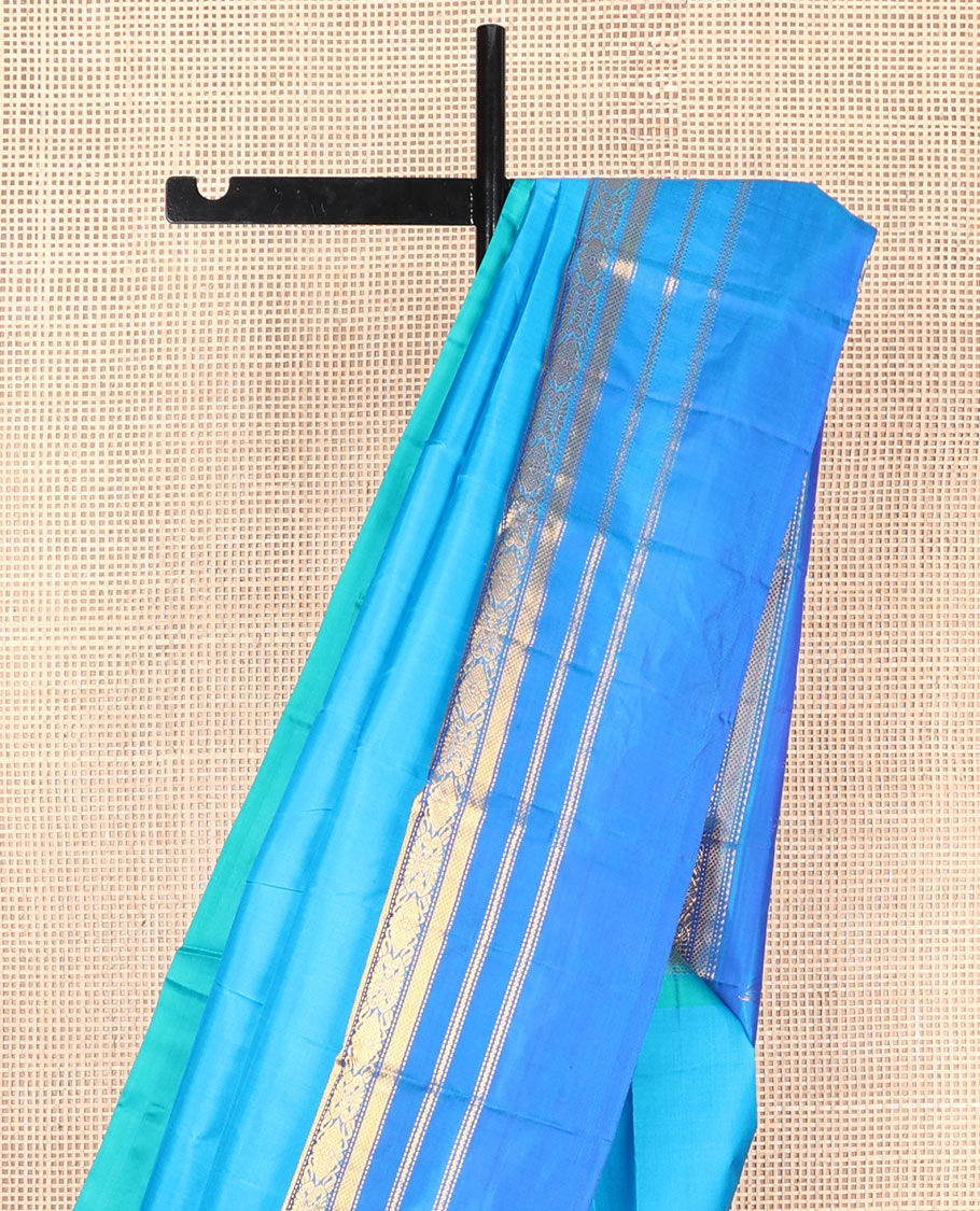 Blue plain design silk saree, contrast border of kuyil kann,muthu,neli & jada nagam designs & zari design pallu
