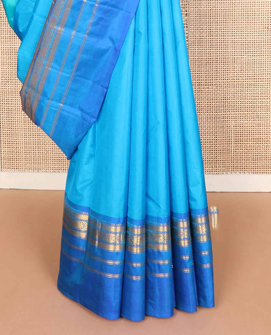 Blue plain design silk saree, contrast border of kuyil kann,muthu,neli & jada nagam designs & zari design pallu