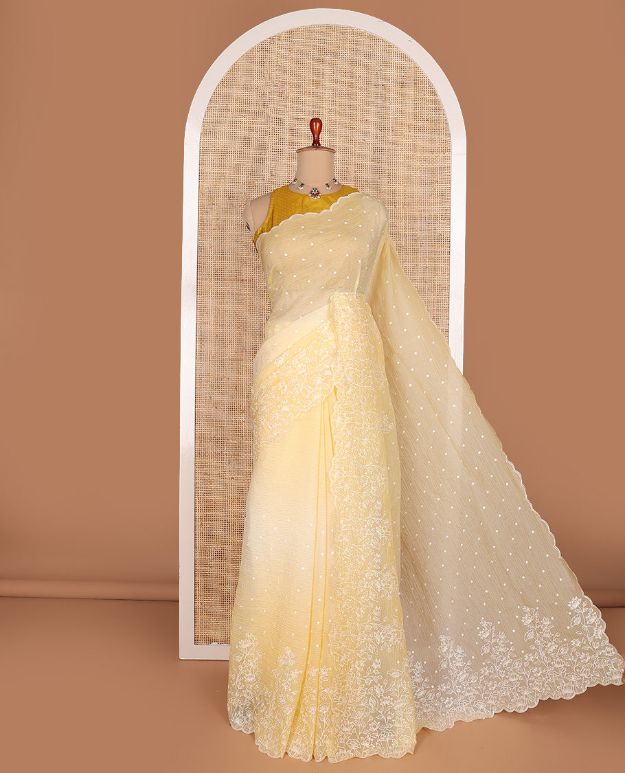Yellow dots thread embroidered designer saree, scallop floral vine design embroidered border