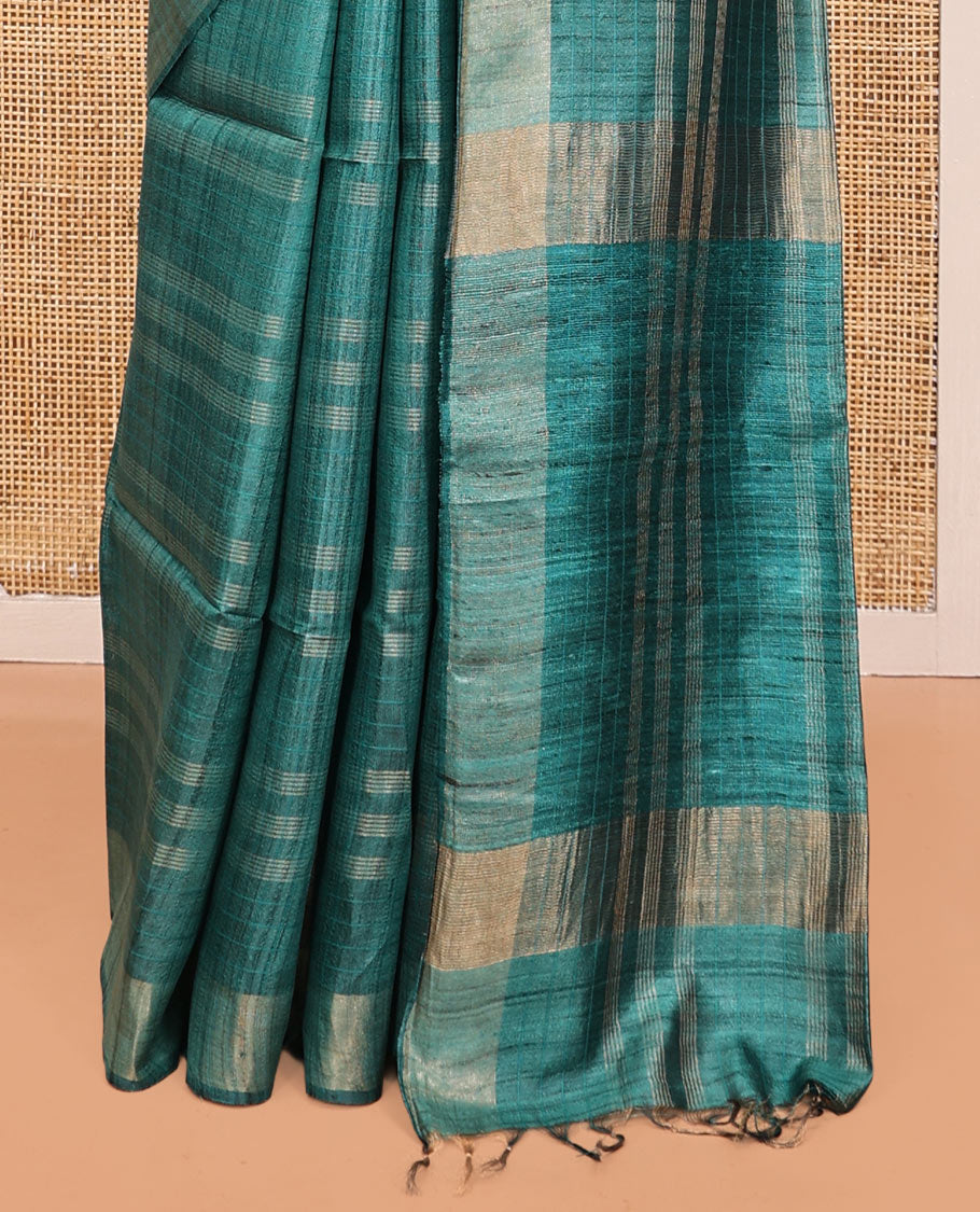 Green Tussar Silk Saree, Sparsely Threaded with Stripes, a Subtle Border, a Self-Pallu, and a Matching Blouse