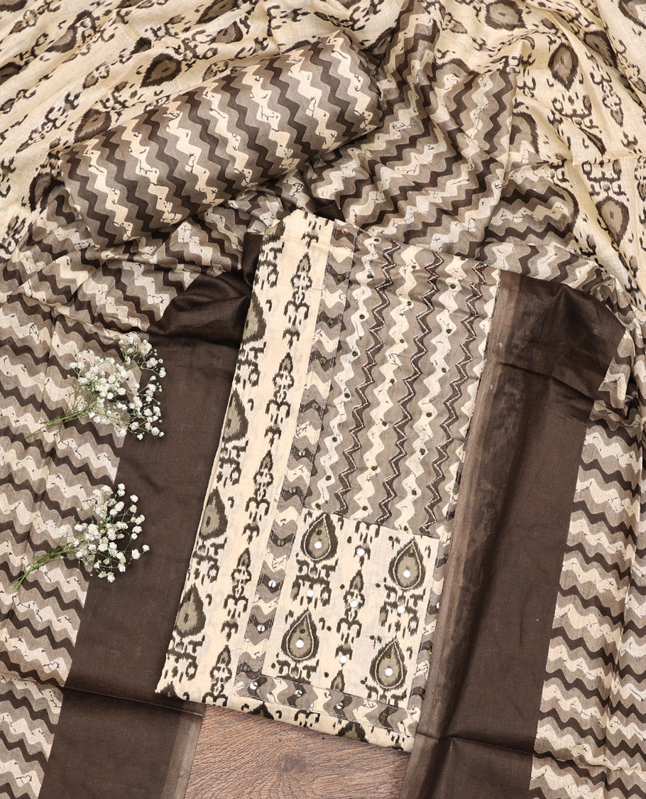 Sandal-Base and Brown Cotton Material Chudidar Set, Adorned with Batik-Style Intricate Print on Its Top, a Batik Chevron Printed Cotton Bottom, and Paired with an Intricately Printed Dupatta