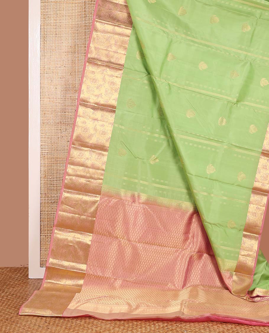Green zari design Vasundhara silk mix saree, contrast floral zari design border, and thilakam design pallu