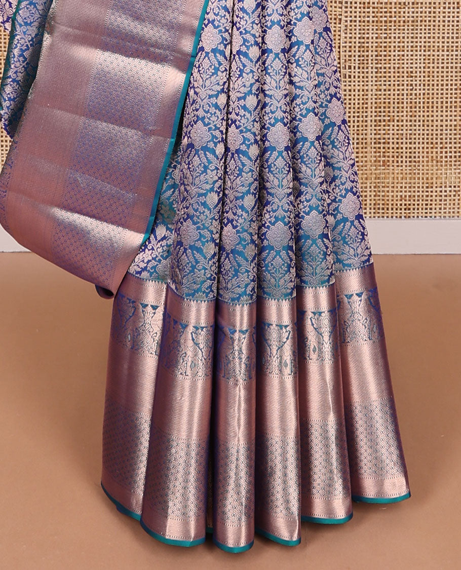 Dark blue floral kancheepuram silk saree with self border of rekku, muthu, banaras & zari design pallu