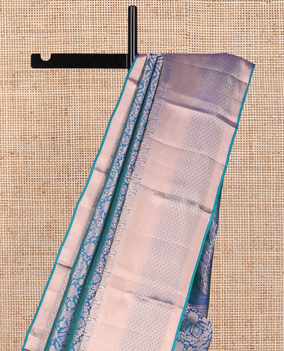 Dark blue floral kancheepuram silk saree with self border of rekku, muthu, banaras & zari design pallu