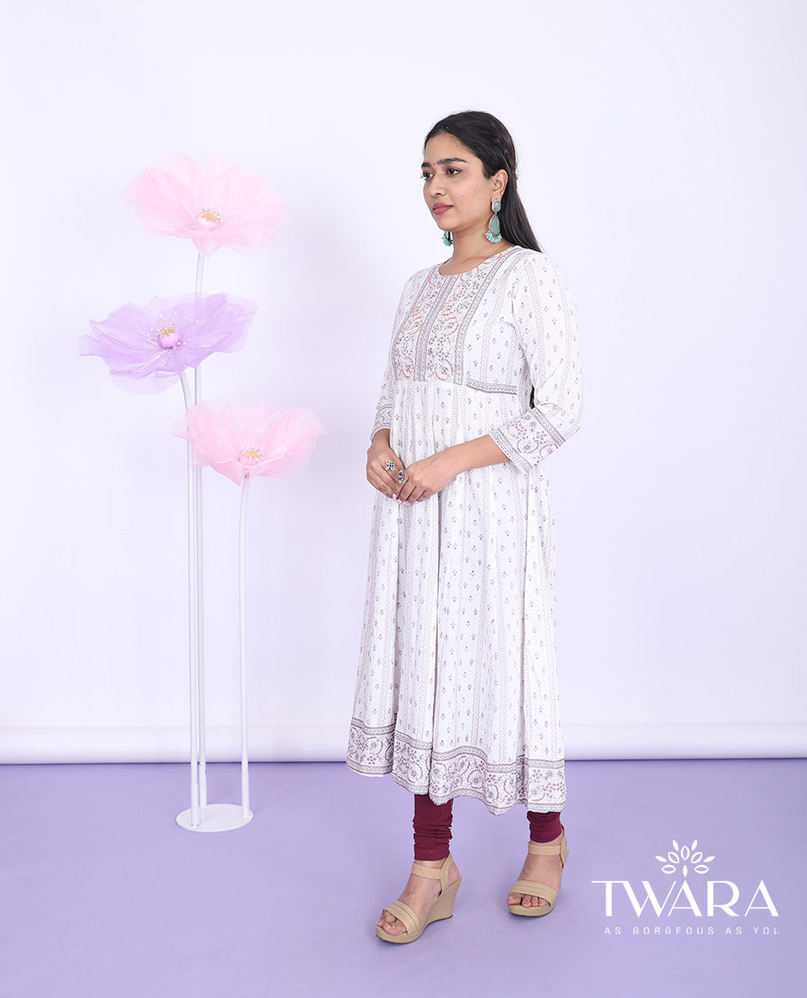 Twara cream unique motifs printed round neck with 3/4th sleeve cotton straight-cut below-knee kurti