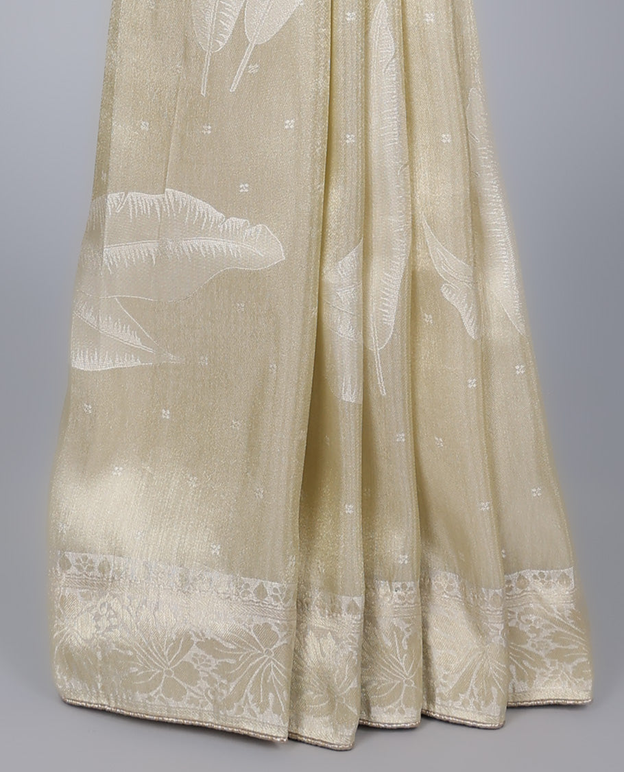 Cream dola silk saree with feather buttas, gleaming border & pallu of intricate designs