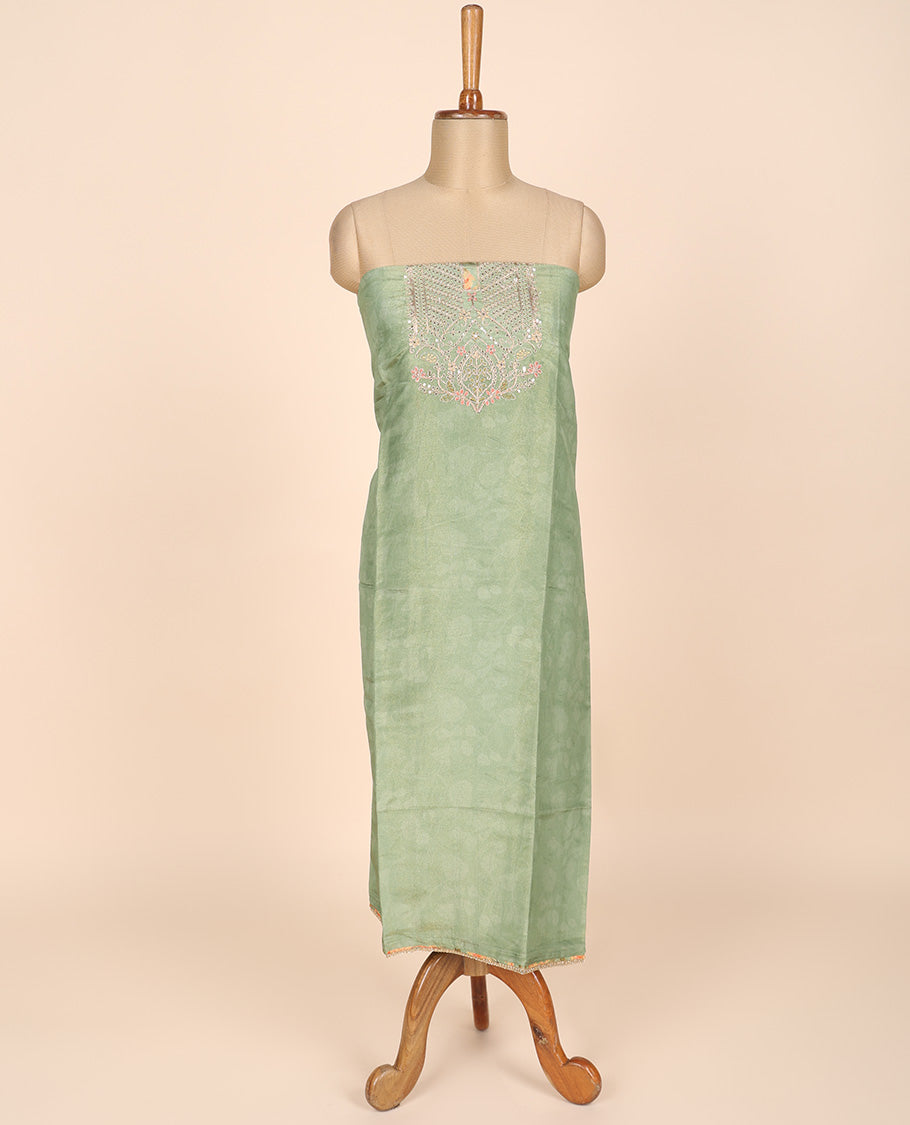Green material churidar set, neck embroidery tissue top, plain bottom & floral vine print & scallop embroidered dupatta