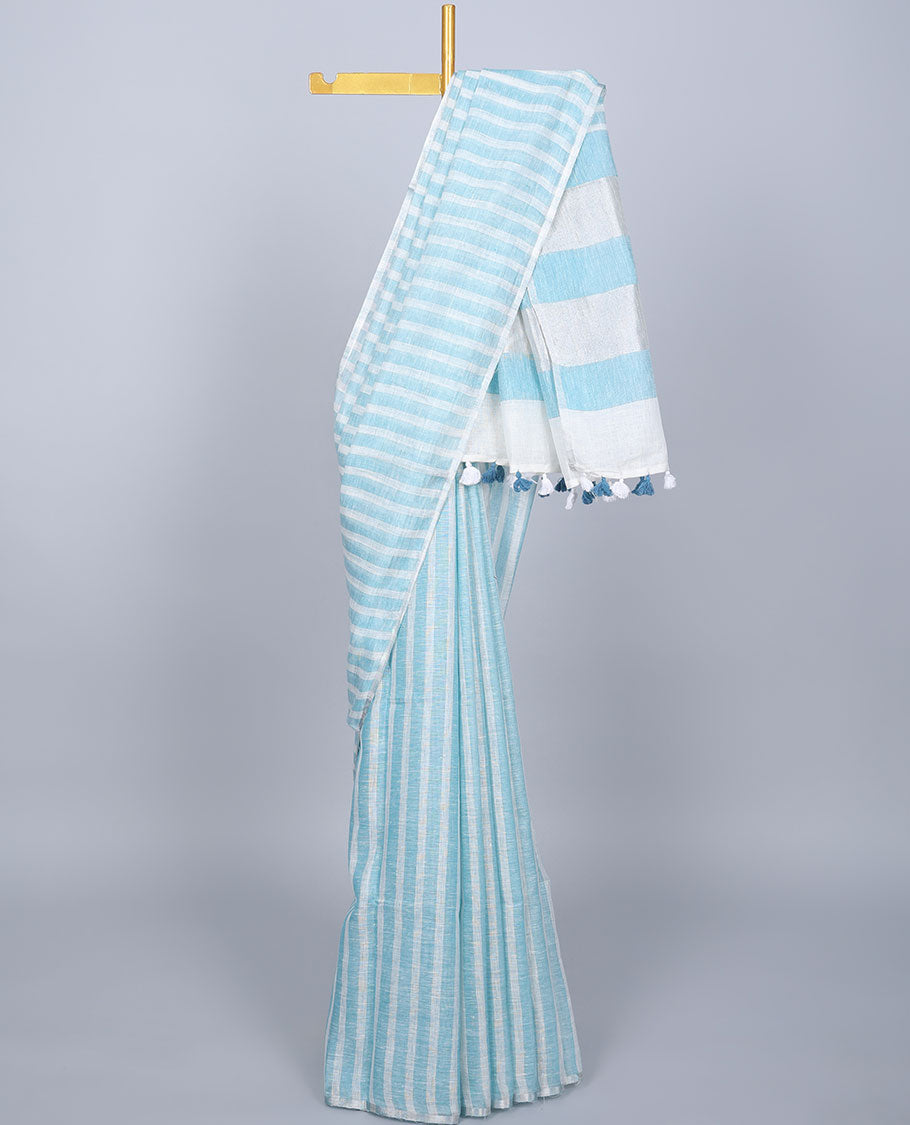 Borderless blue & off-white striped linen saree, self-pallu of stripes with tassels