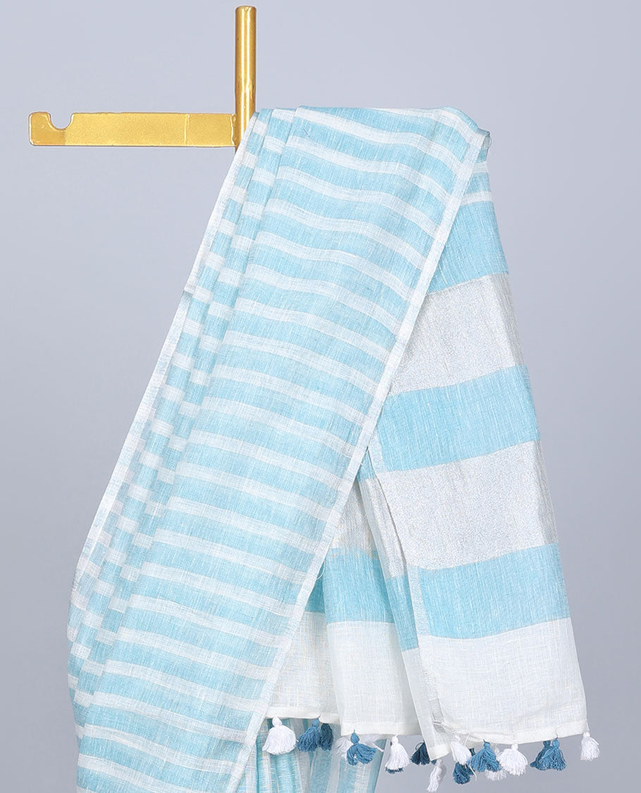 Borderless blue & off-white striped linen saree, self-pallu of stripes with tassels
