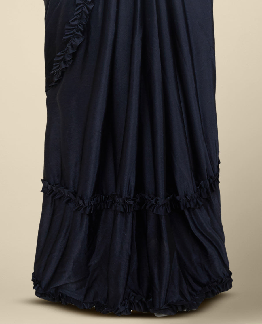 Black plain frilled readymade satin saree with frilled border & intricate embroidery sweetheart neck elbow sleeve blouse