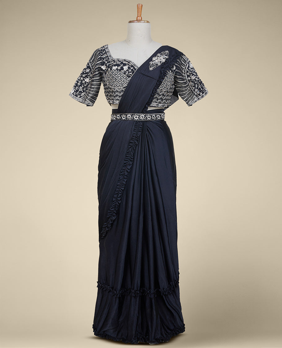 Black plain frilled readymade satin saree with frilled border & intricate embroidery sweetheart neck elbow sleeve blouse