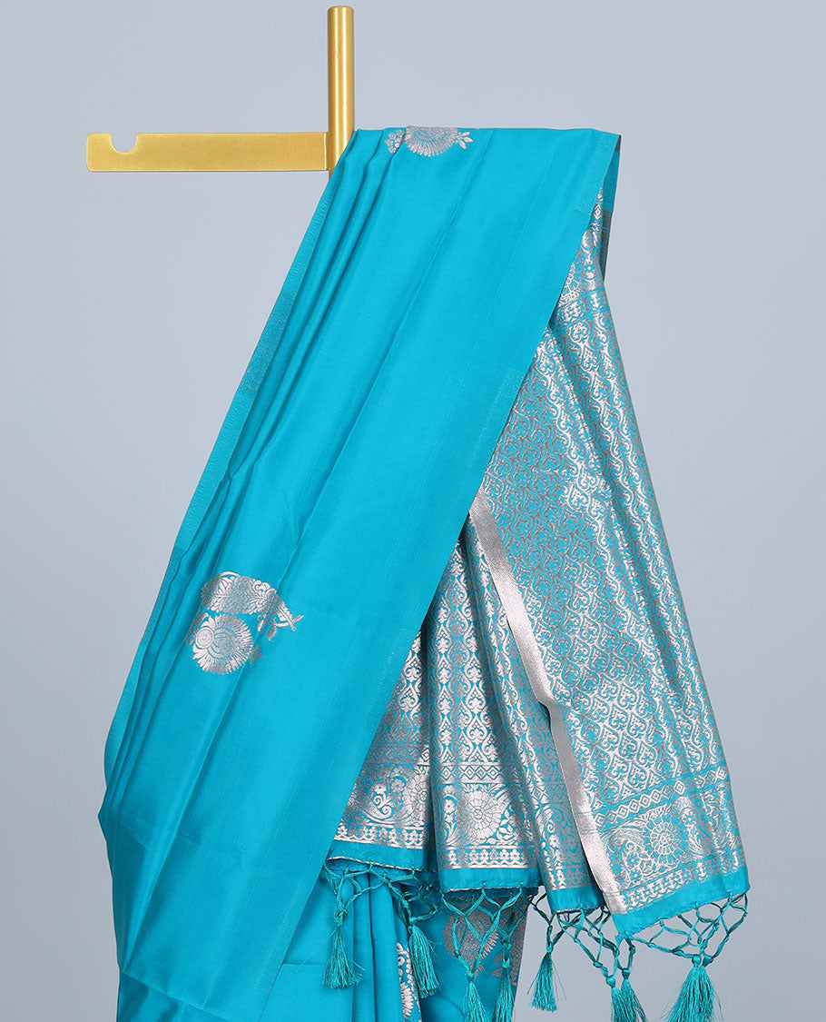 Borderless pink butter silk saree with zari buttas, self-pallu of ogee patterns