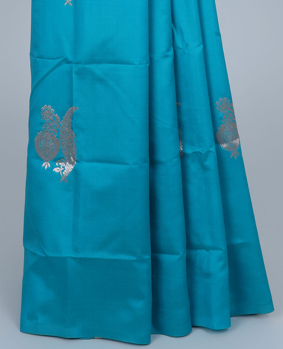 Borderless pink butter silk saree with zari buttas, self-pallu of ogee patterns