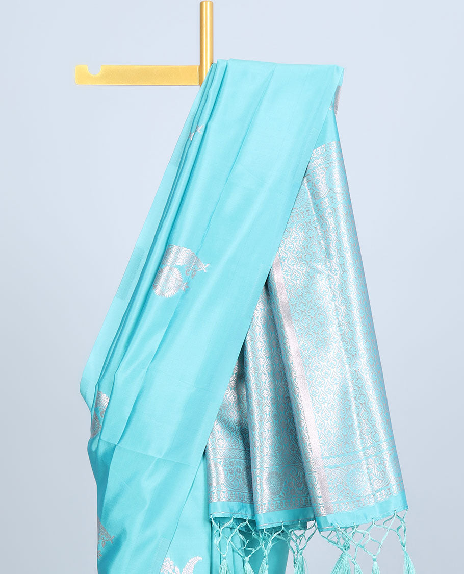 Borderless pink butter silk saree with zari buttas, self-pallu of ogee patterns