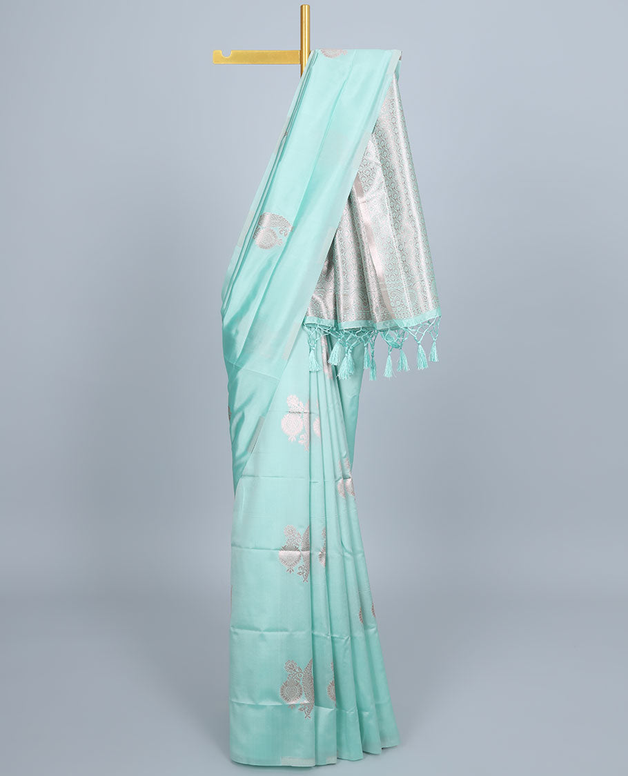 Borderless green butter silk saree with zari buttas, zari pallu of intricate ogee patterns