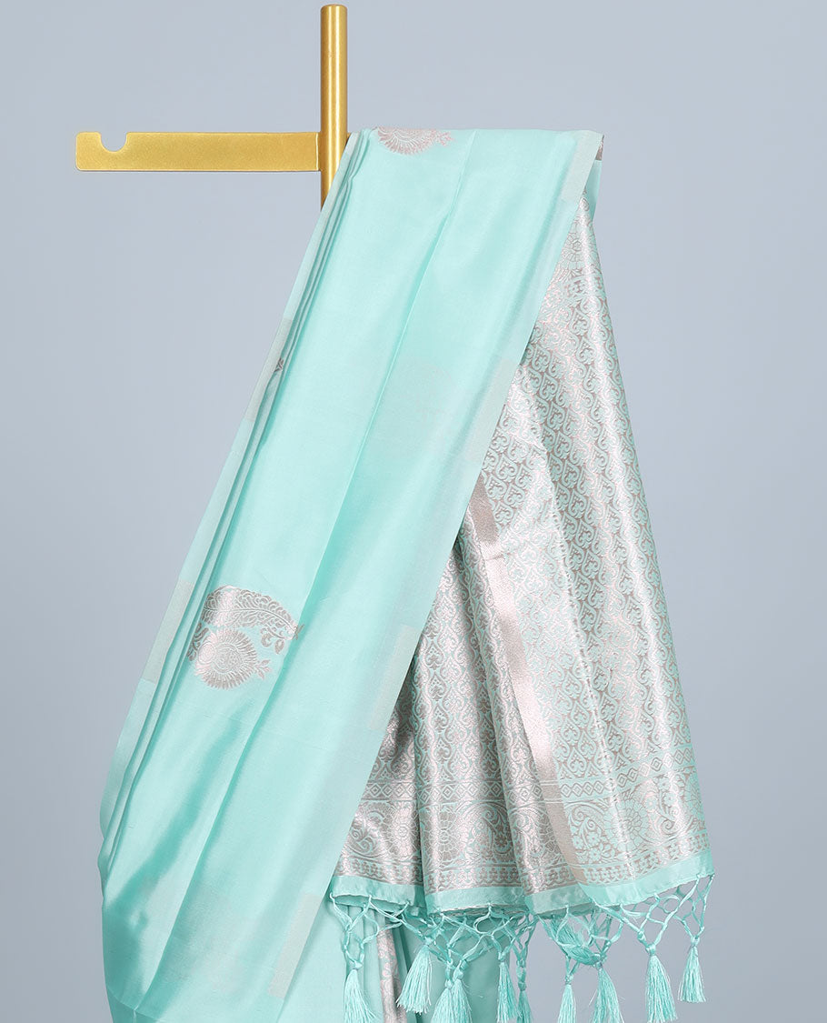 Borderless green butter silk saree with zari buttas, zari pallu of intricate ogee patterns