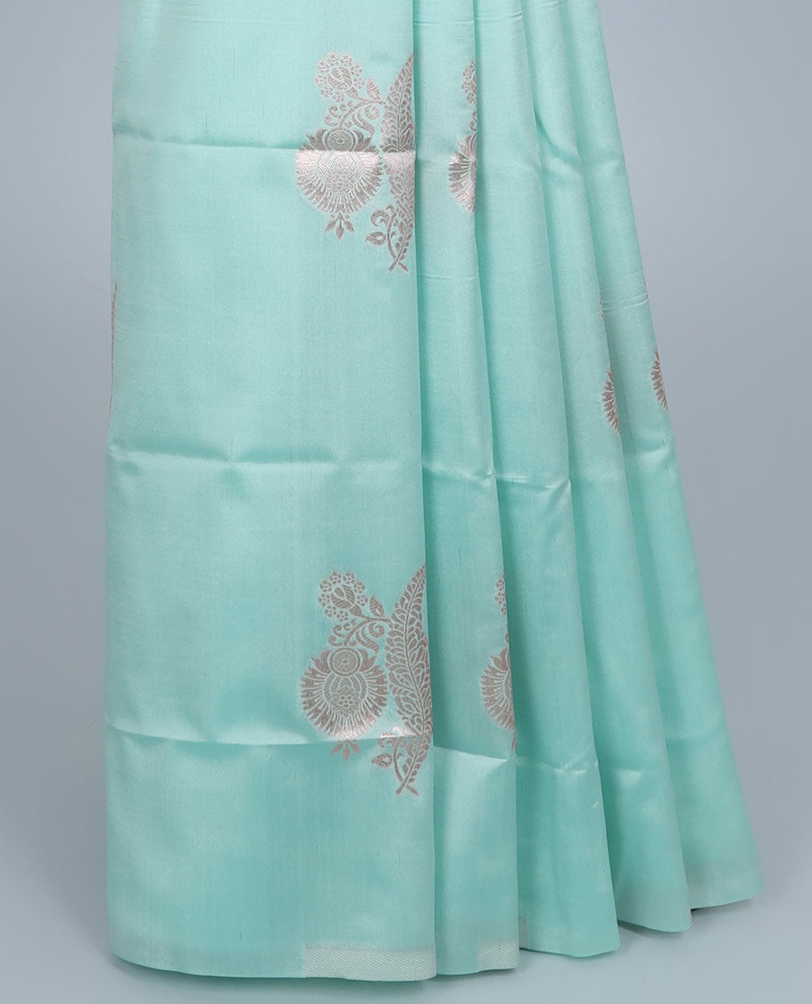 Borderless green butter silk saree with zari buttas, zari pallu of intricate ogee patterns