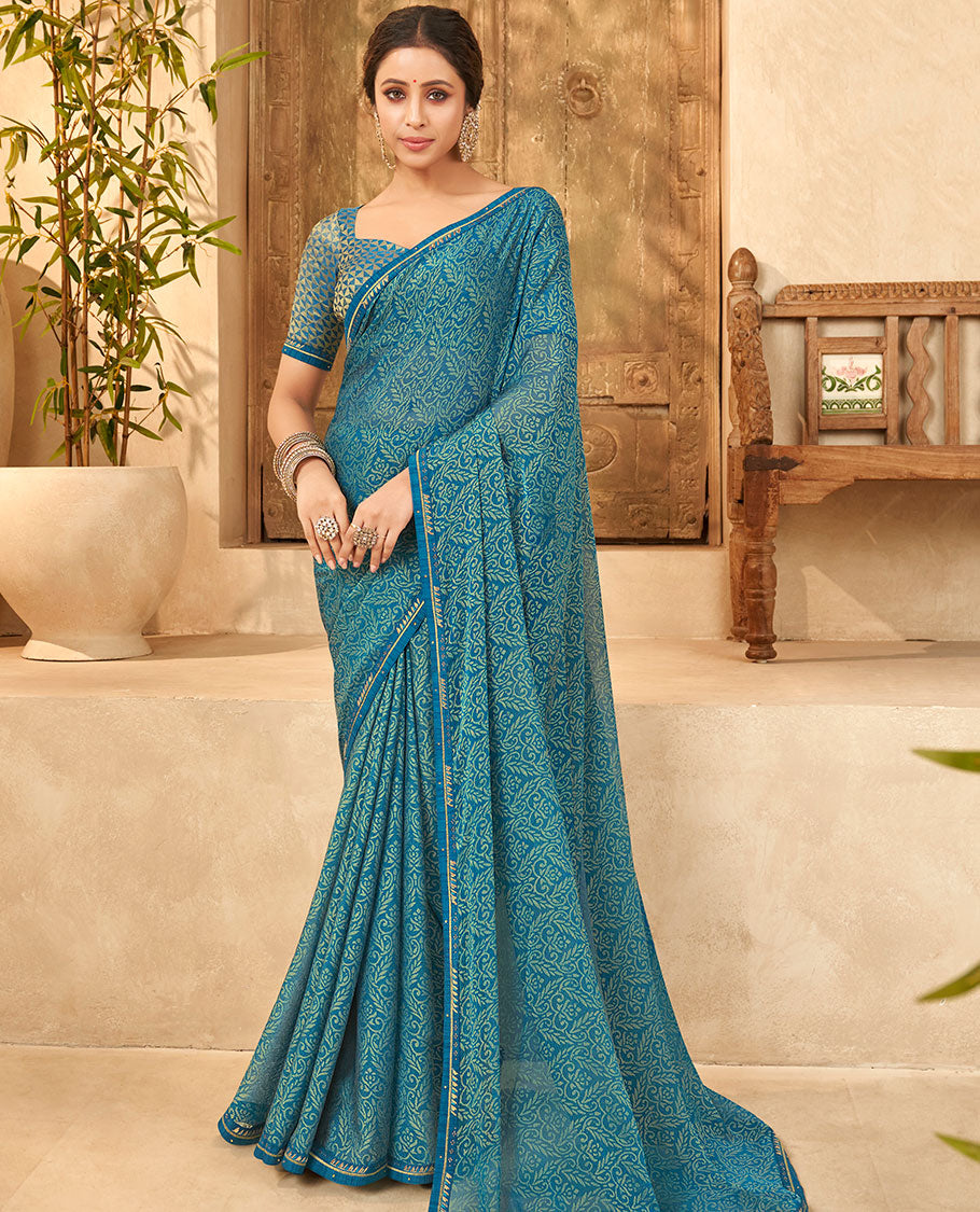 Blue intricate floral printed casual wear brasso saree, embroidered border