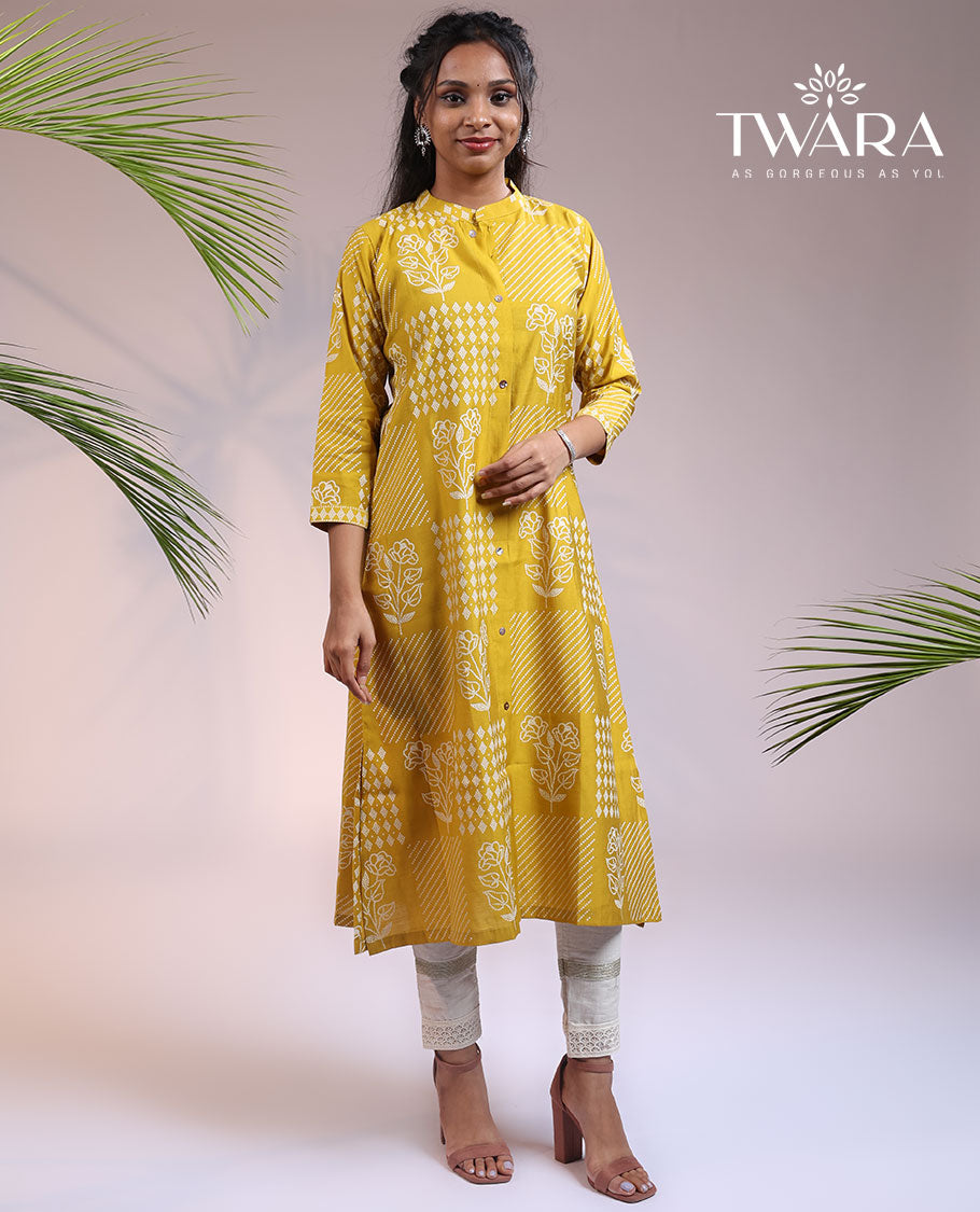 Twara yellow floral motifs with bandhani dots printed 3/4th sleeve & Chinese collar muslin straight-cut below-knee kurti