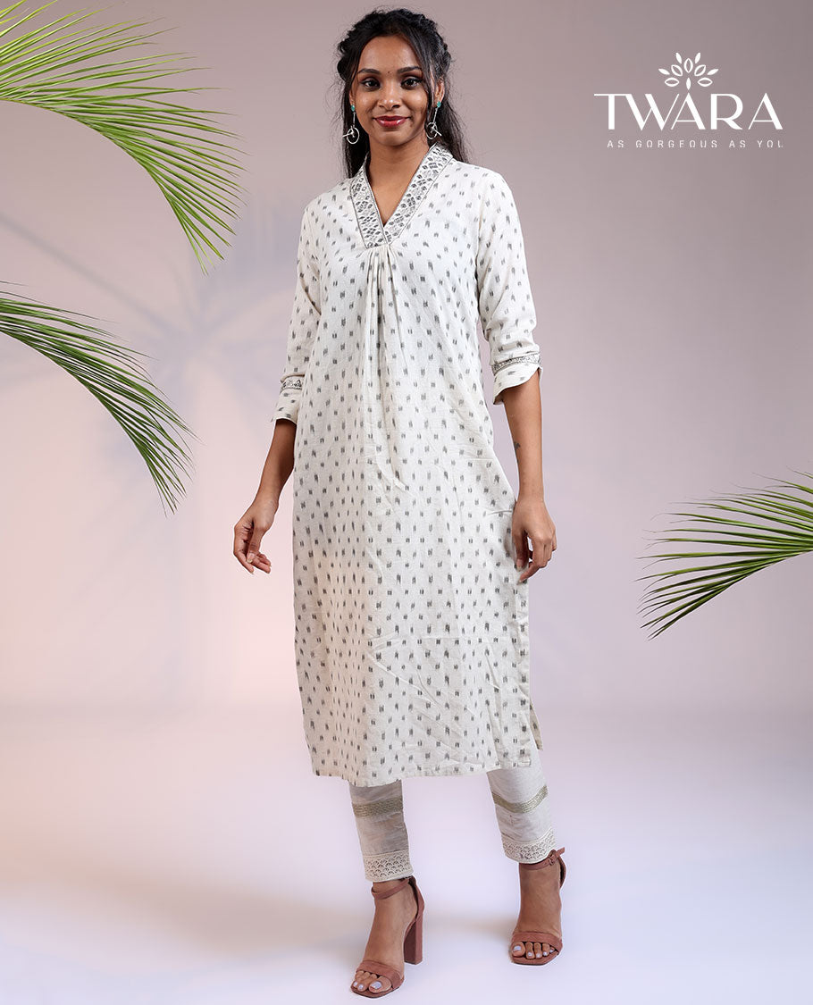 Twara cream unique buttas 3/4th sleeve & V-neck cotton straight-cut below-knee kurti