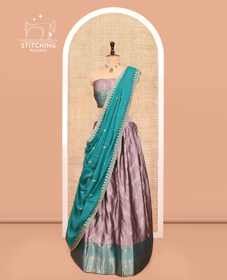 Grey Banarasi Half-Saree, Subtly Sparkled with Jacquard Design, a Contrast Traditional Zari Border, a Matching Blouse, and a Contrast Embroidered Dhavani