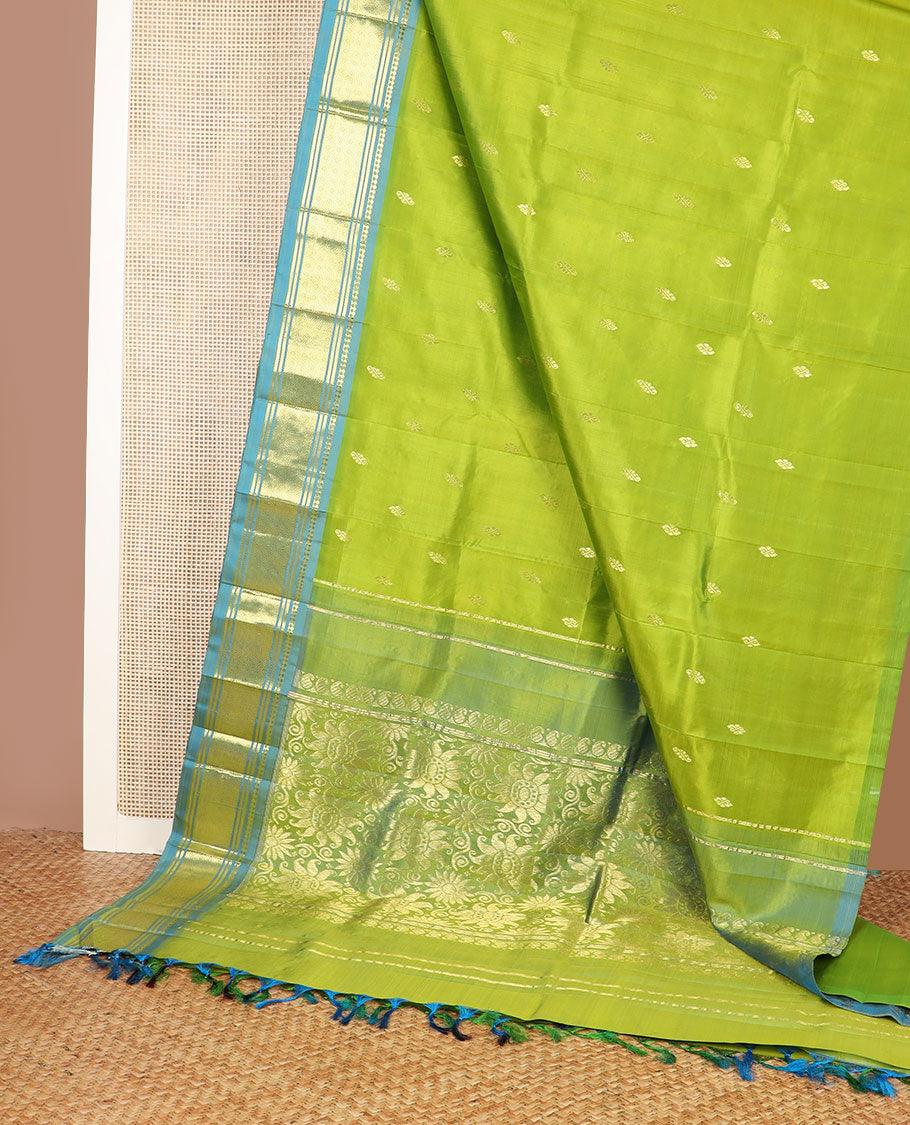 Parrot green zari buttas kanchipuram silk saree, contrast one-sided border of panner sombu,banaras & jaal & floral design pallu
