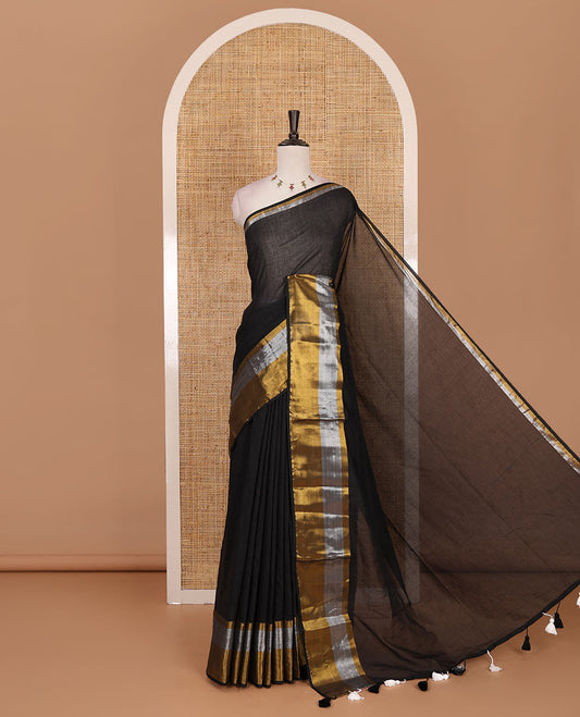 Inky black plain khadi mul cotton saree, contrast silver and golden bavanji border and matching zari border blouse