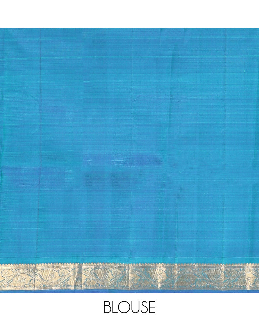 Blue Kanchipuram Silk Saree, Sparsely Sparkled with Mayil Butta Enclosed Checked All Over Its Body, Complemented by a Contrast Traditional Zari Design Border, Pallu of Jaal Designs, and Paired with a Contrast Blouse
