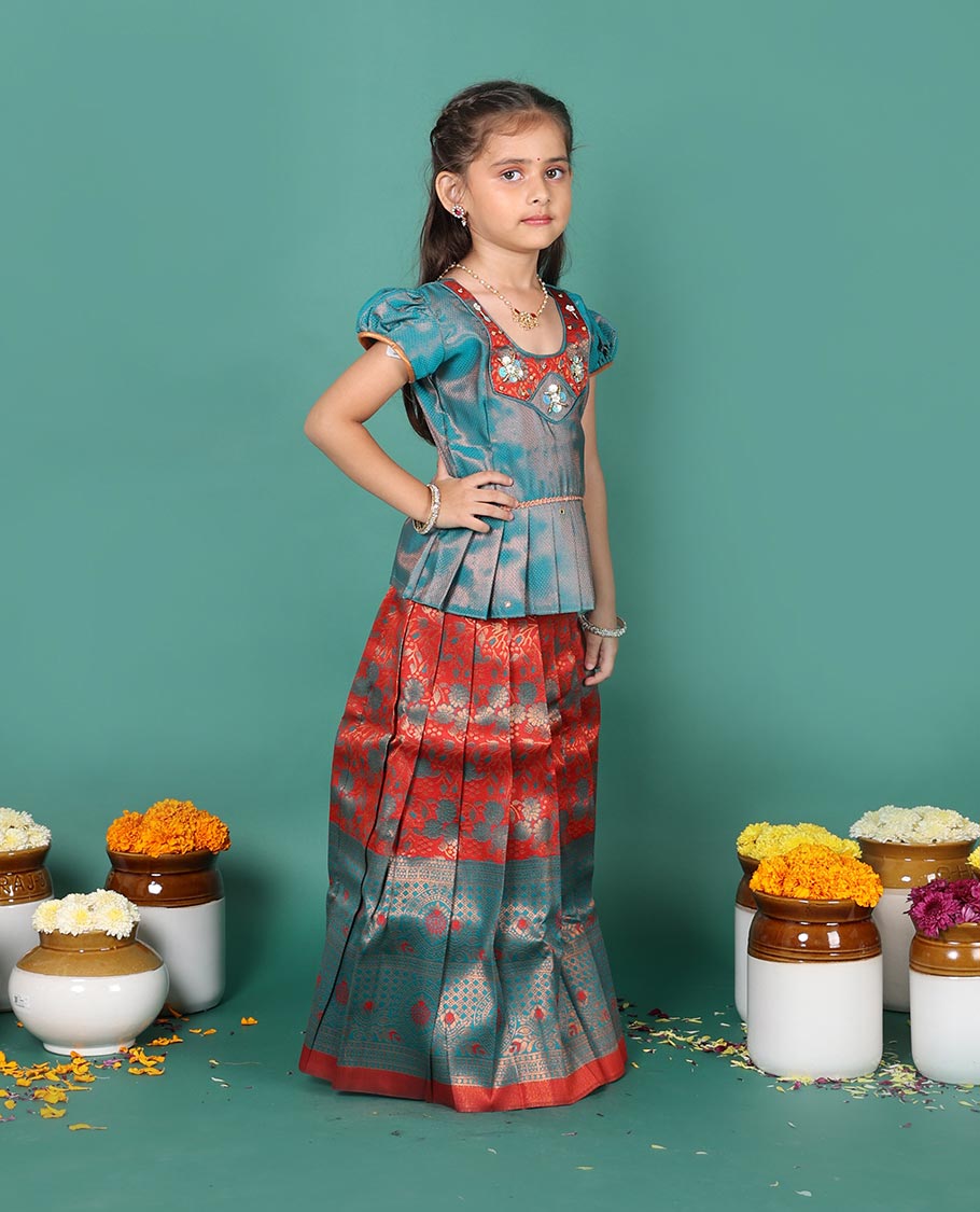 Rust art silk pavadai readymade set, jacquard with contrast traditional zari border skirt, contrast jacquard embroidered round neck puff-sleeve blouse