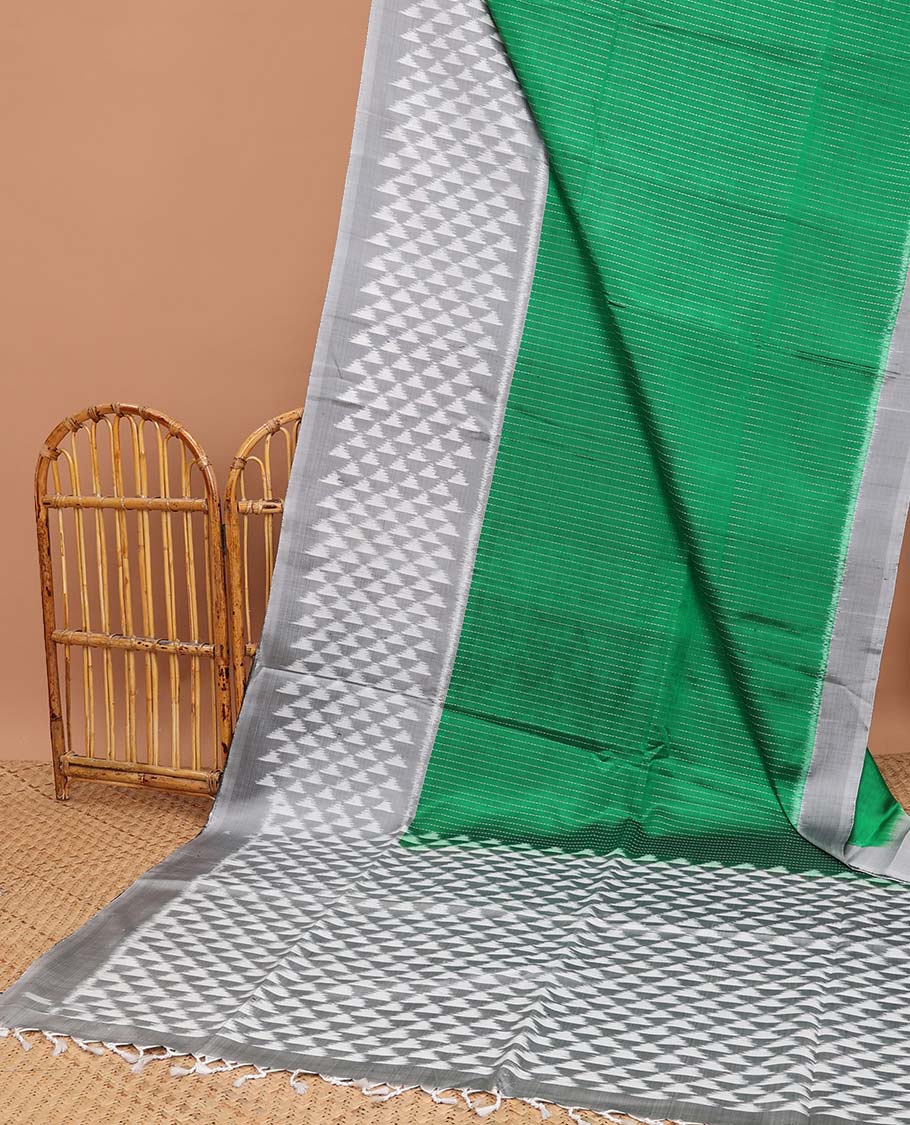 Green checked soft silk saree with contrast border & ara maadam design pallu