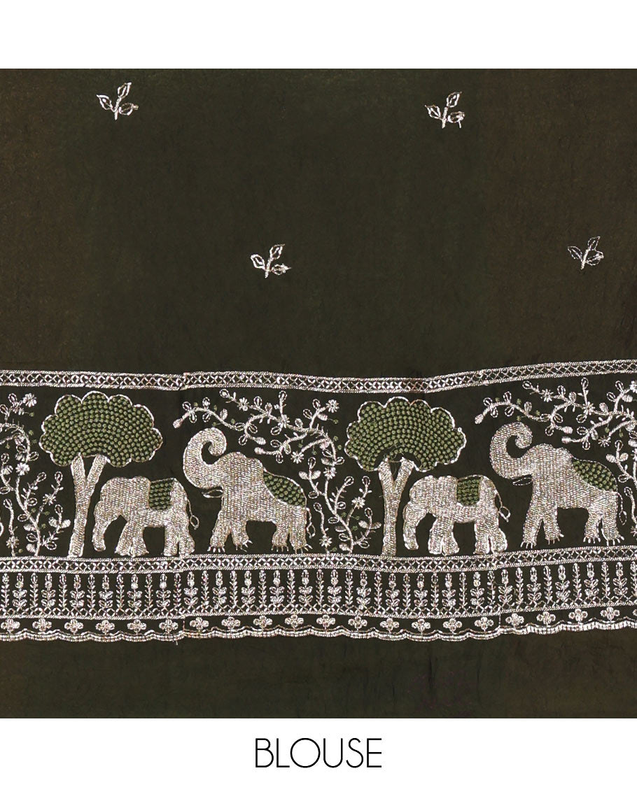Green Chinon Chiffon Saree, Prettified with Gold Zari Checked Design on Its Body, Self-Pallu, and Paired with a Contrast Elephant-Tree-Themed French Knot Embroidered Blouse