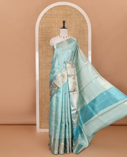 Sea green floral jaal jacquard celebrity tissue saree, zari border of multi-color floral motifs embroidery, jaal pallu & brocade blouse