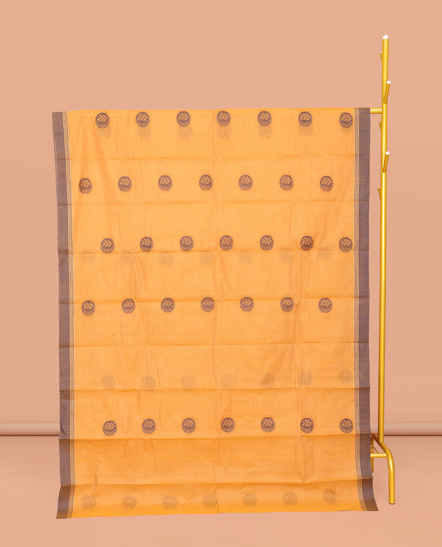 Orange Chettinad Cotton Saree, Beautified with Buttas All Over Its Body, Complemented by a Contrast Border, Pallu of Intricate Designs, and Paired with a Matching Blouse