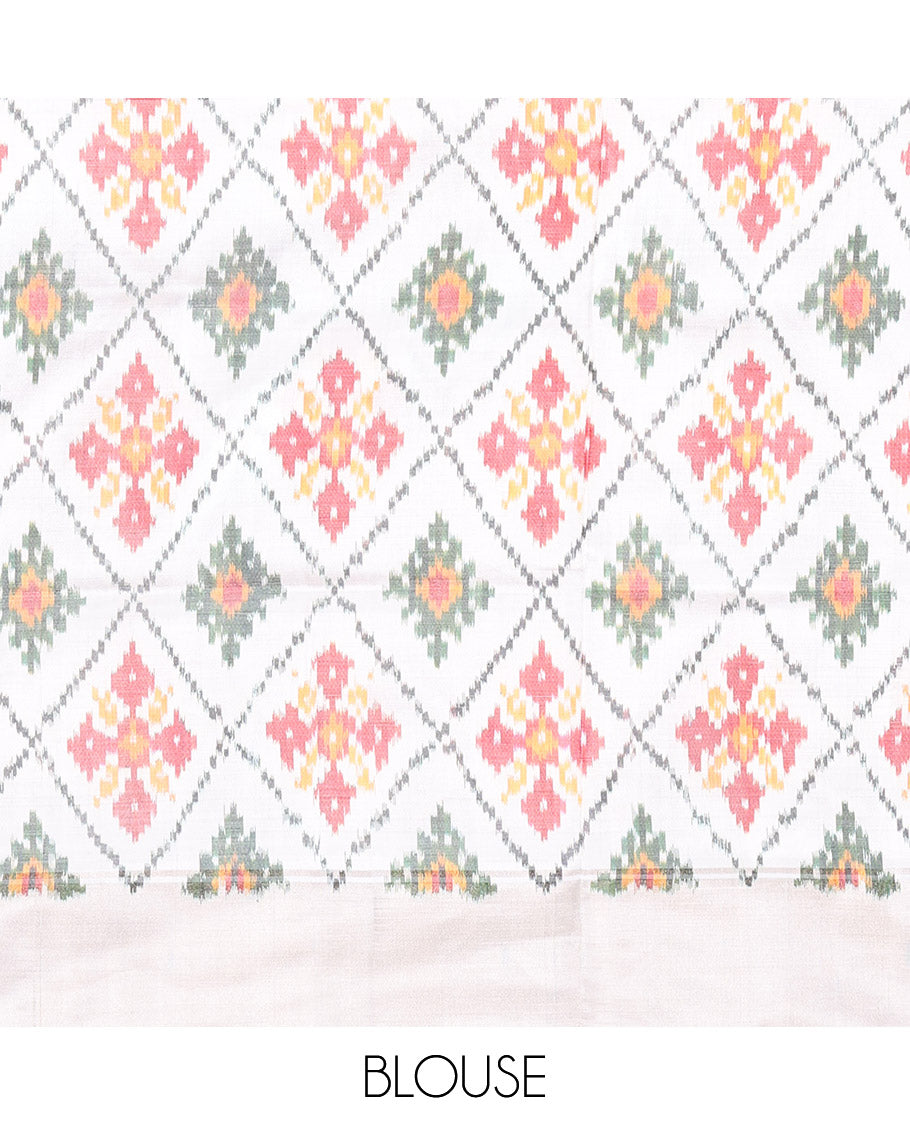 Grey Pochampally Ikat Silk Saree, Subtly Sparkled with Ikkat Buttas on Its Body, Complemented by a Contrast Diamond-Patterned Border, Pallu of Diamond-Patterns, and Paired with a Contrast Blouse