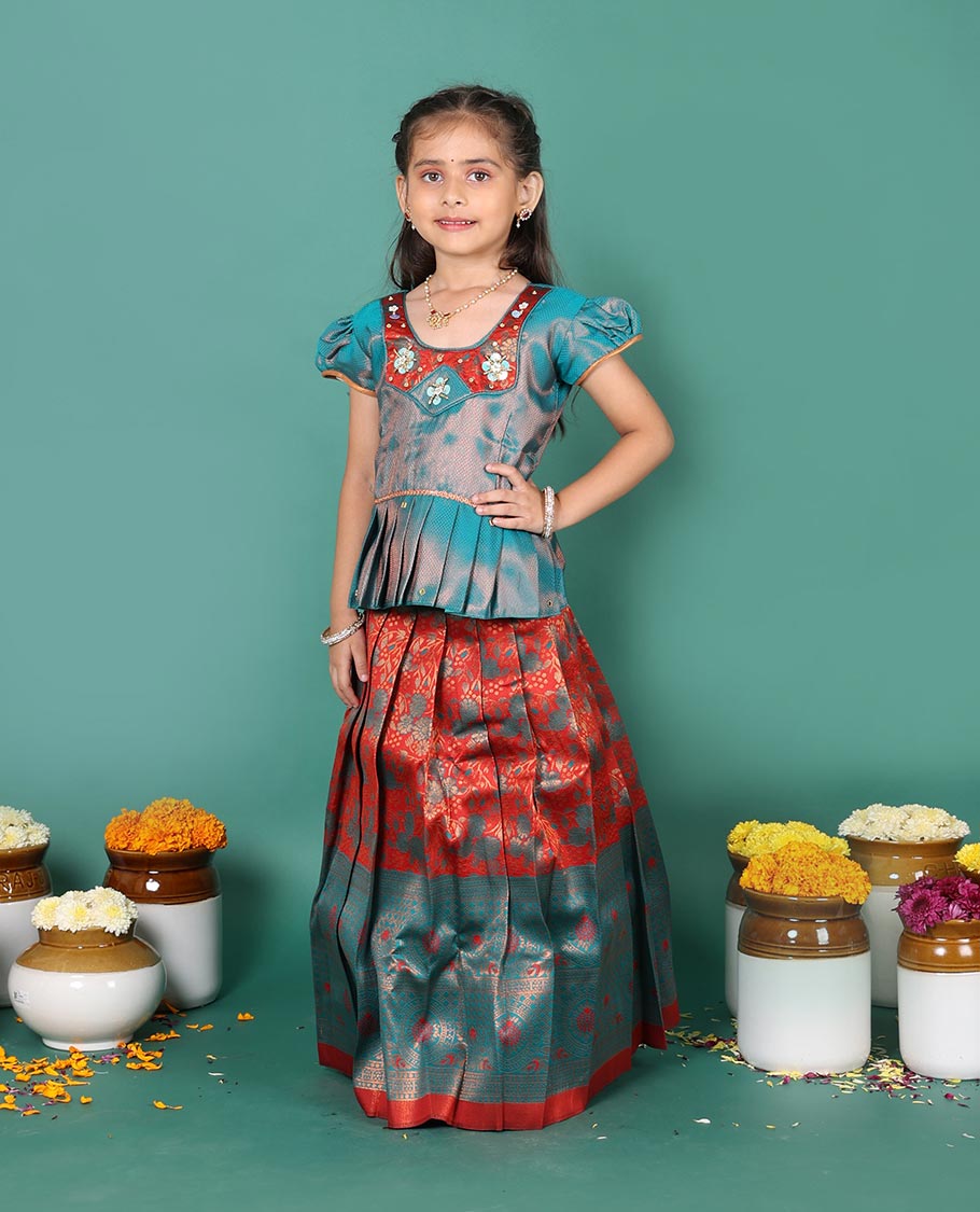 Rust art silk pavadai readymade set, jacquard with contrast traditional zari border skirt, contrast jacquard embroidered round neck puff-sleeve blouse