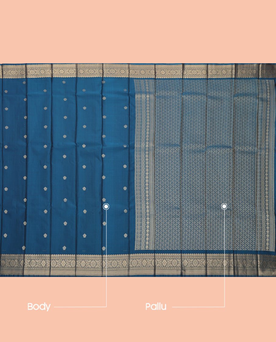 Peacock Blue Budget Silk Saree, Gracefully Embellished with Zari Buttas, Highlighted by a Traditional Zari Border, Jaal Pallu, and Matching Blouse
