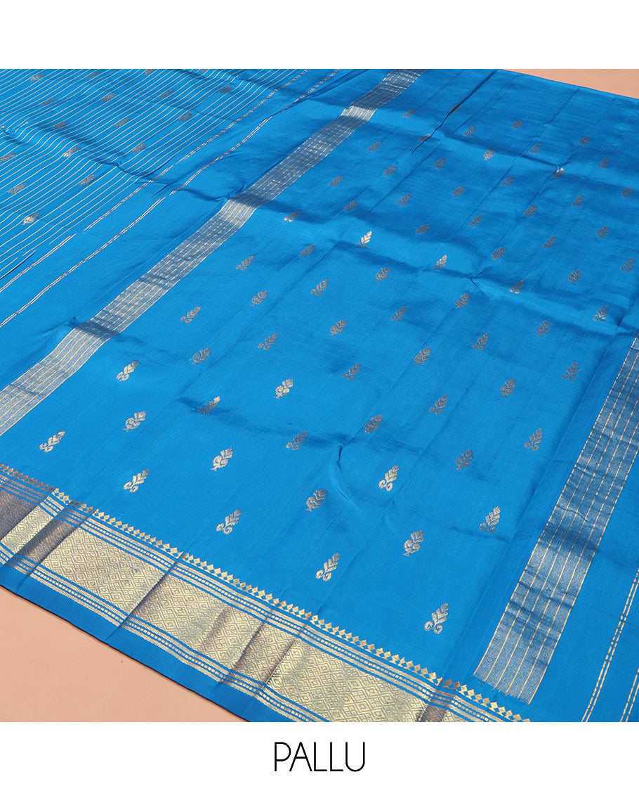 Blue Kanchipuram Silk Saree, Beautified with Zari Buttas and Stripes on Its Body, Highlighted by a Zari One-Sided Border of Panner Sombu, Banaras, and Jaal Designs, Pallu Features Zari Designs, and Comes Without a Blouse