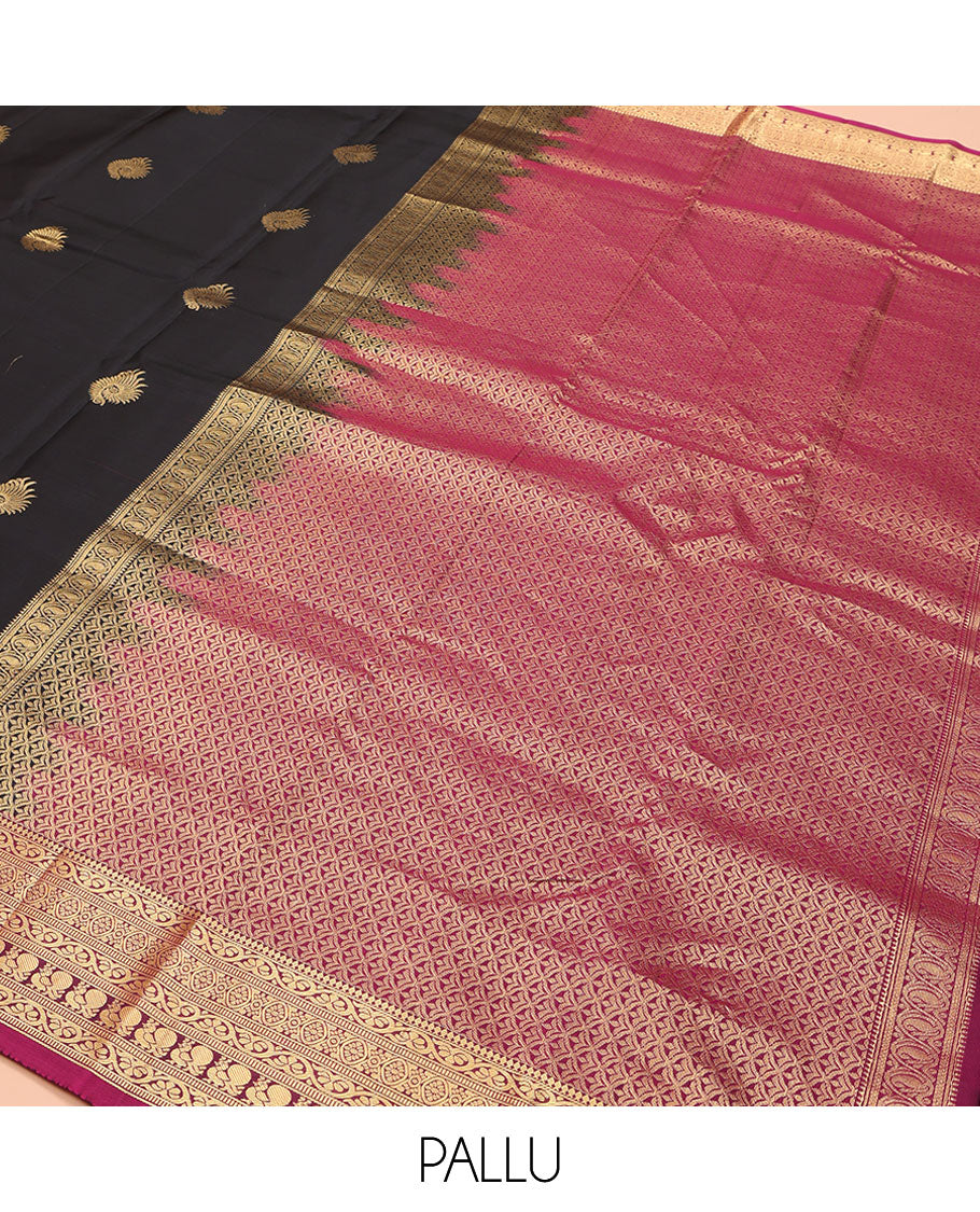 Black Vasundhara Lite Silk Mix Saree, Embellished with Zari Buttas on Its Body, Complemented by a Contrast Border of Thilakam Mokku,kodi Visiry, Muthu, Chakra, and Mayil Designs, Scallop Design Pallu, and Paired with a Contrast Blouse