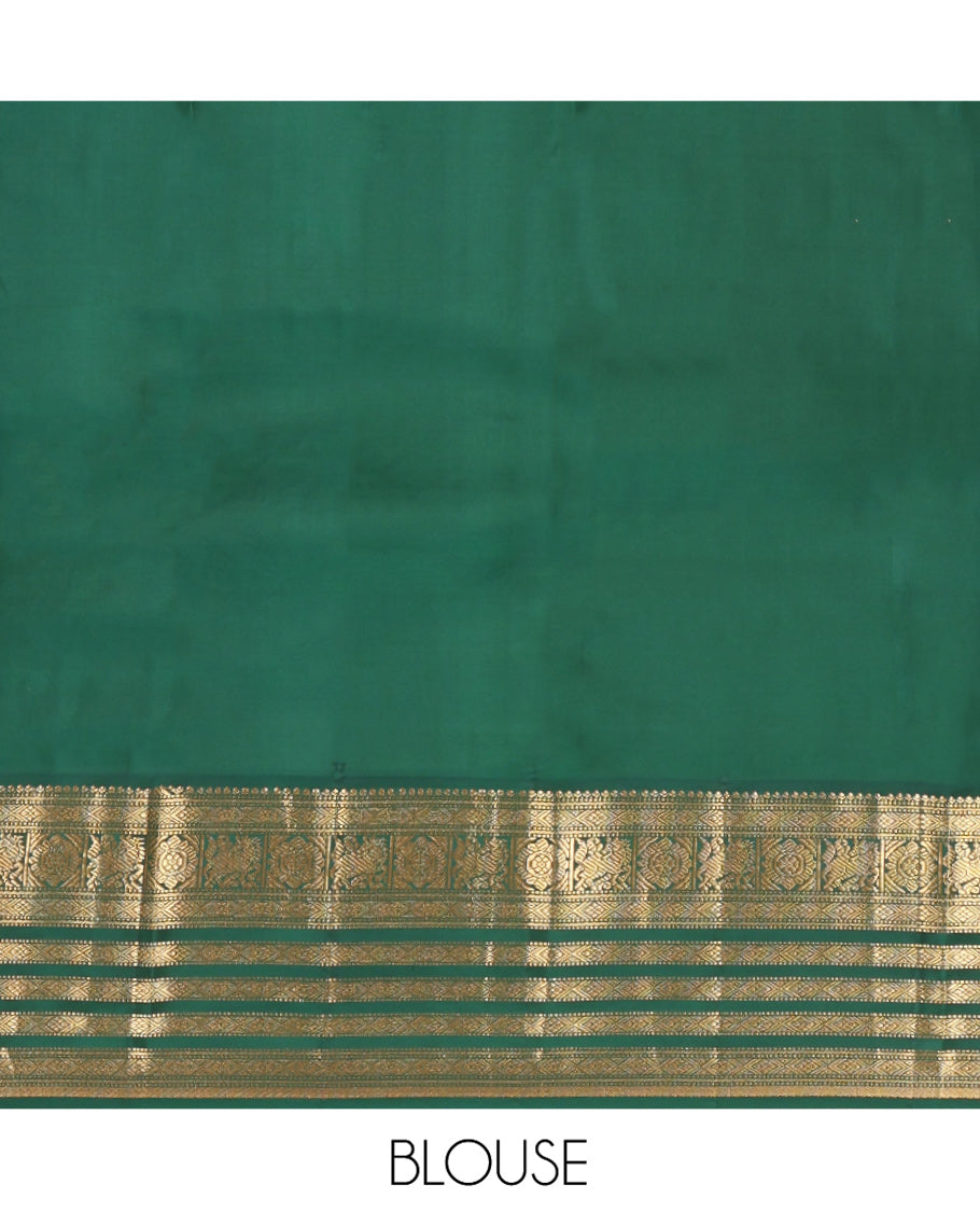Cream Vasundhara Silk Saree, Enthralled with Zari Buttas All Over Its Body, Complemented by a Contrast Border of Muthu, Diamond, Kuthirai, Chakram, and Diamond Designs, Grand Pallu, and Paired with a Contrast Blouse