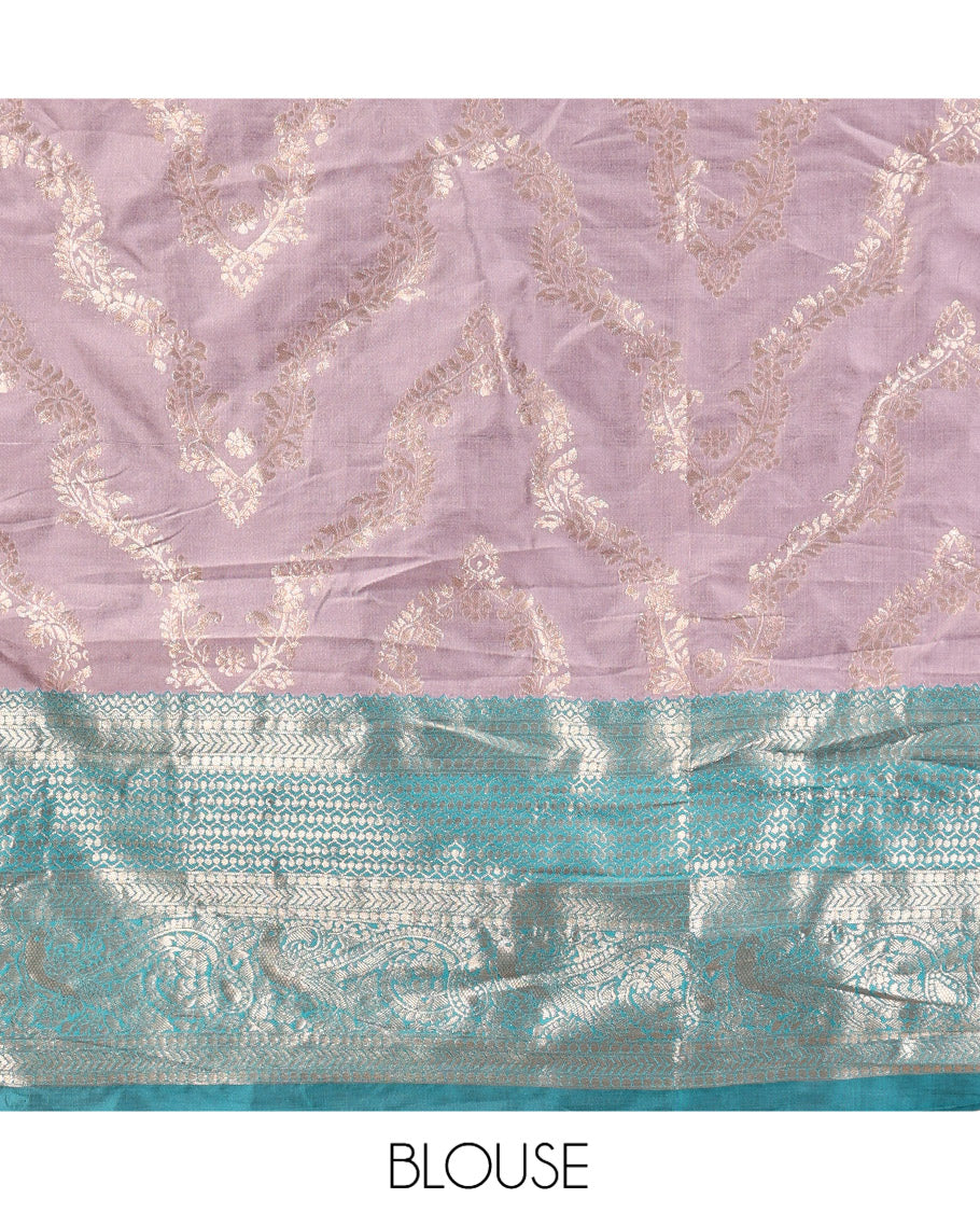 Grey Banarasi Half-Saree, Subtly Sparkled with Jacquard Design, a Contrast Traditional Zari Border, a Matching Blouse, and a Contrast Embroidered Dhavani