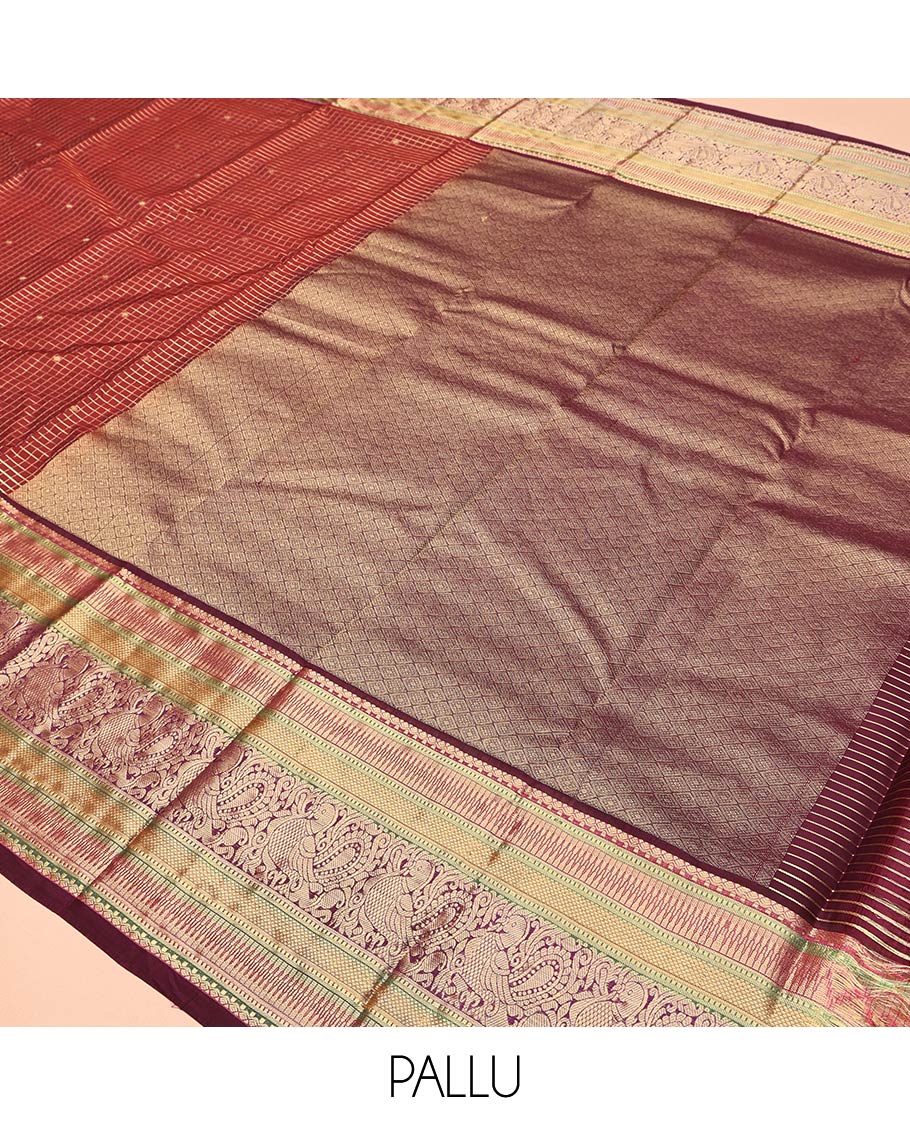 Maroon Vasundhara Lite Silk Mix Saree, Adorned with Zari Butta Enclosed Checks, a Zari Border of Rekku, Kuyil Kann, and Mayil Designs, Grand Pallu, and a Matching Blouse