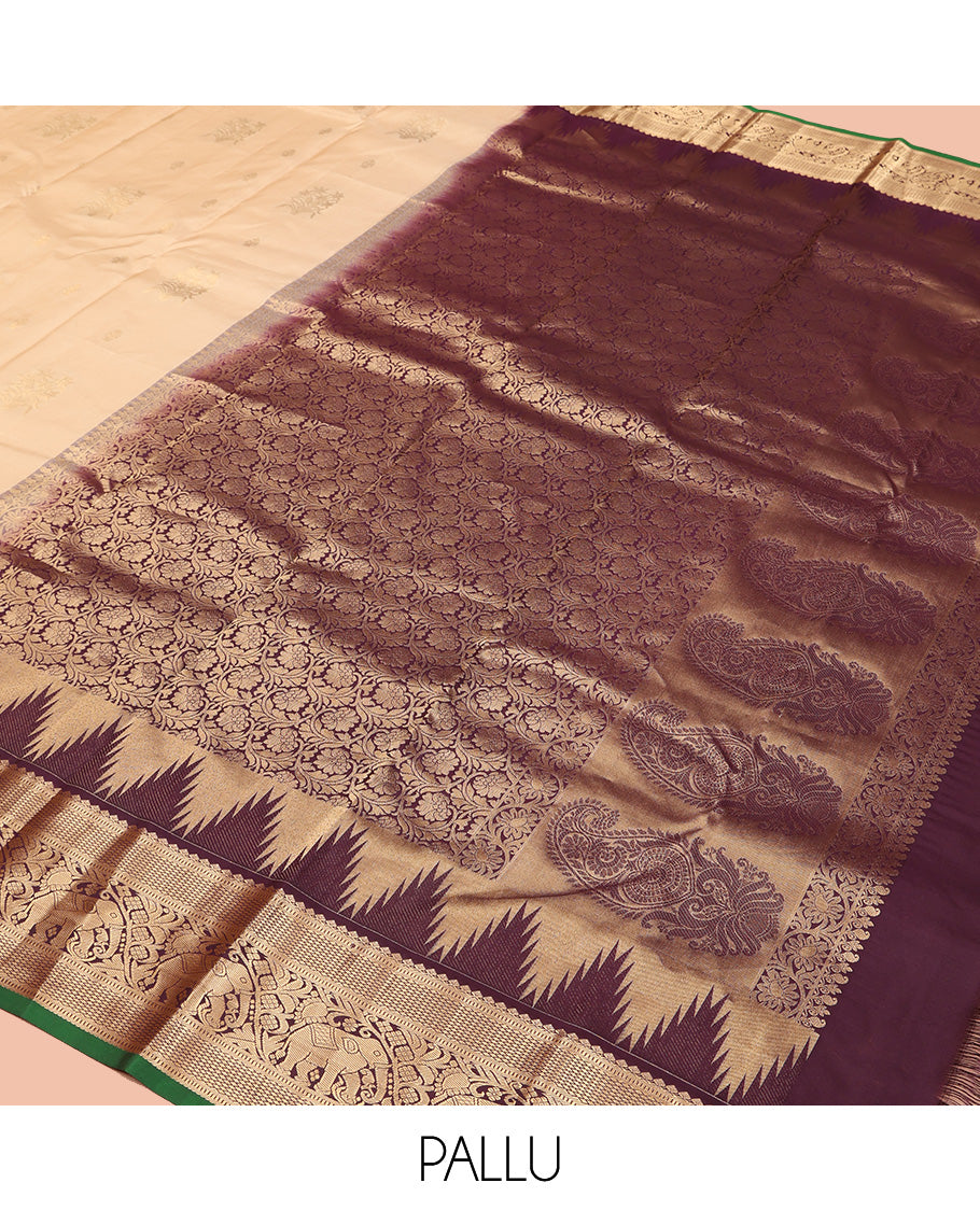 Sandal Vasundhara Silk Saree, Sparsely Woven with Zari Buttas All Over Its Body, Complemented by Contrast Border of Mayil Kann and Yaanai Designs, Grandly Decked Up Pallu and Paired with a Contrast Blouse