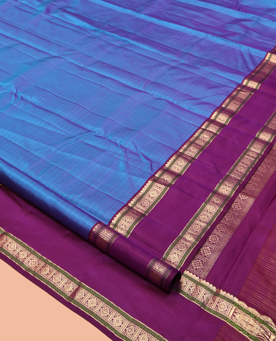 Blue Striped Kanchipuram Silk Saree, Complemented by Contrast Rettai Pettu Border, Pallu of Intricate Designs, and a Contrast Blouse
