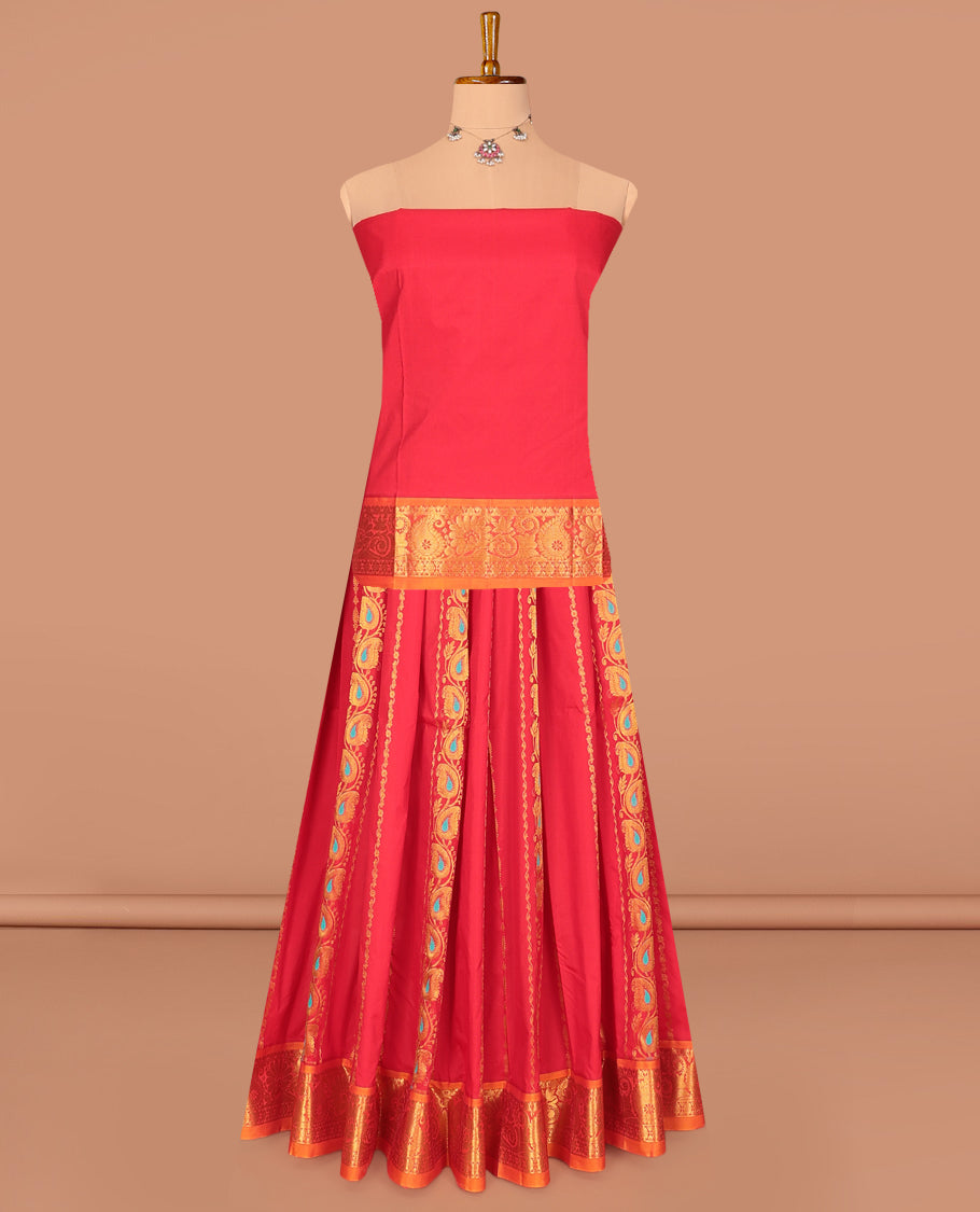 Red Art Silk Pavadai Material Set, Enriched with Zari Designs on Its Skirt, Complemented by a Contrast Paisley Zari Border, and a Matching Blouse