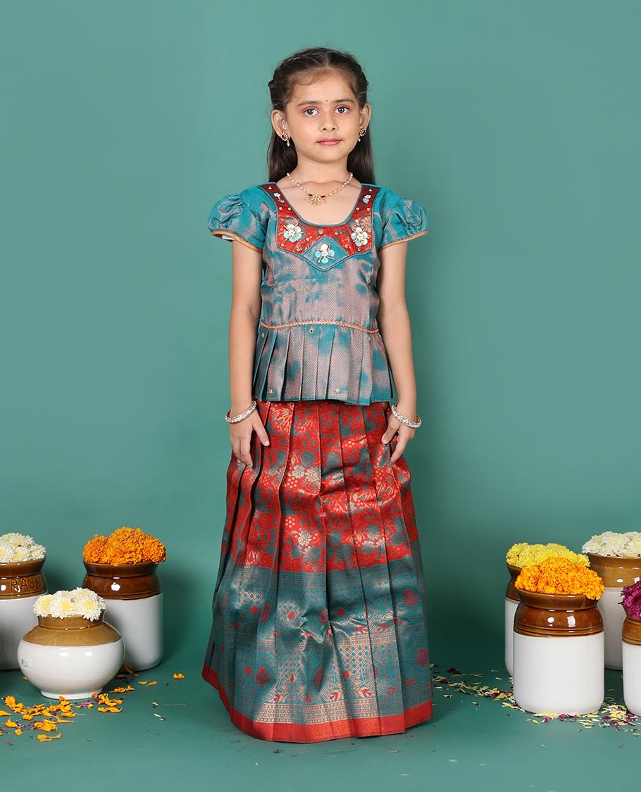 Rust art silk pavadai readymade set, jacquard with contrast traditional zari border skirt, contrast jacquard embroidered round neck puff-sleeve blouse