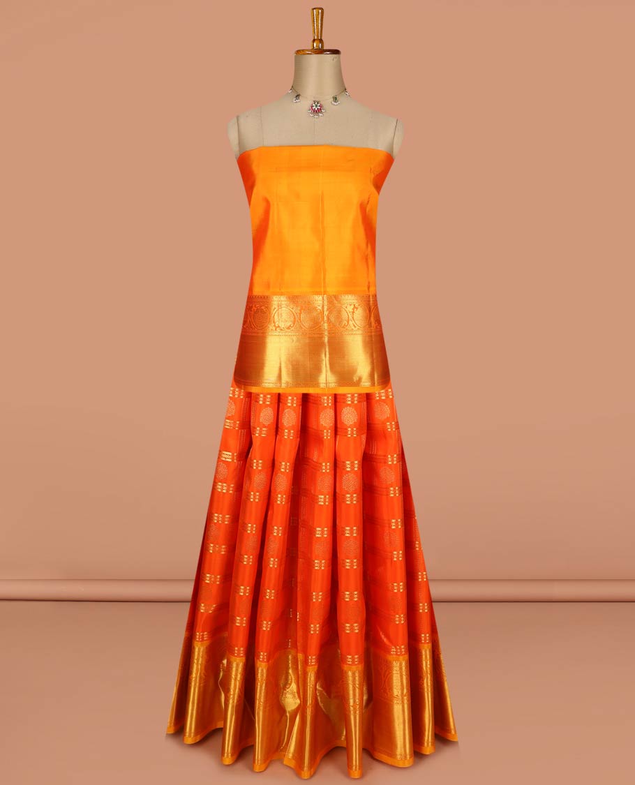 Orange pure-silk half-saree, zari buttas and checked skirt, contrast kodi visiry border, zari design blouse, and a intricate zari woven dhavani