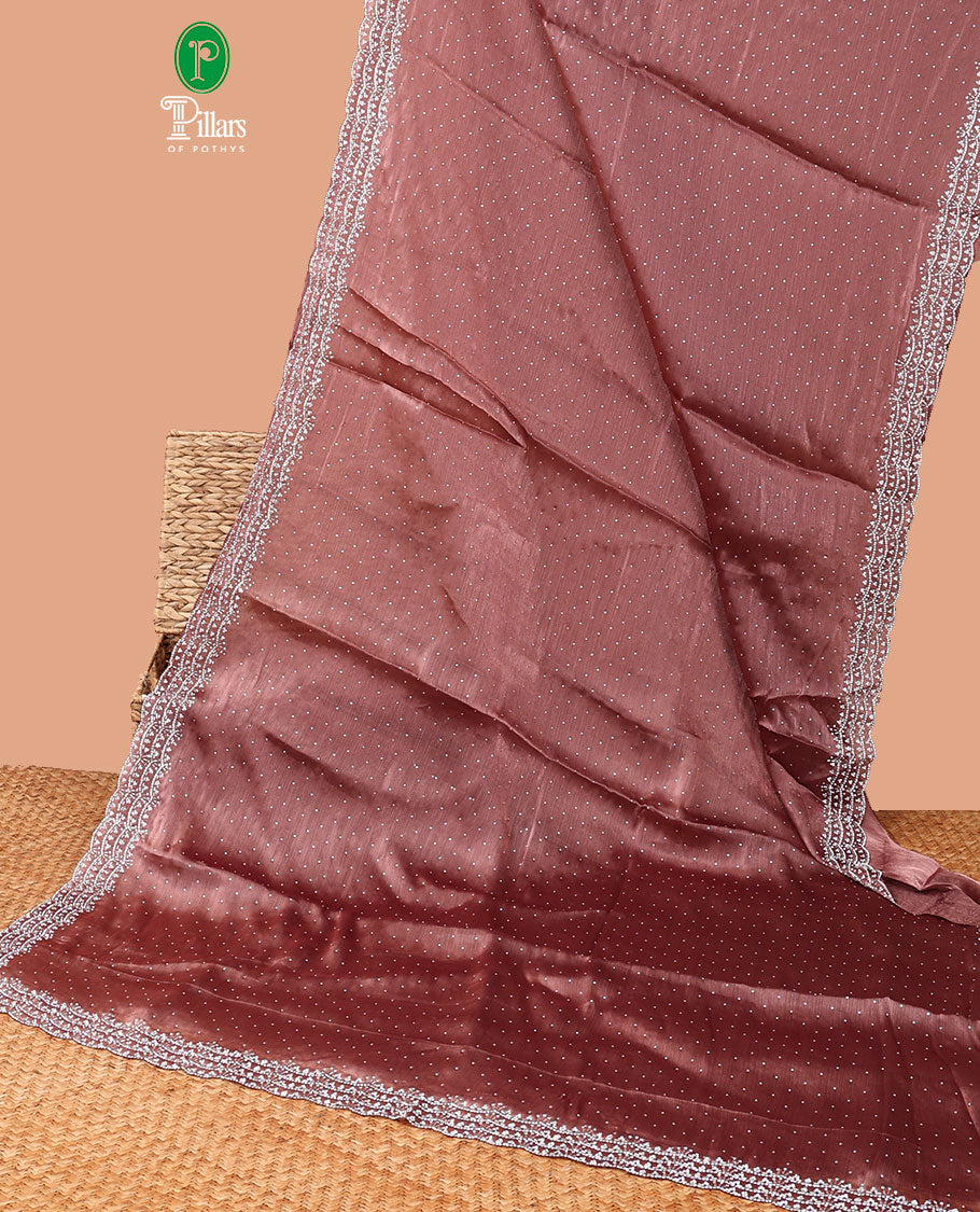 Pink all-over stone work burburry chiffion saree with self cutthana stone work border